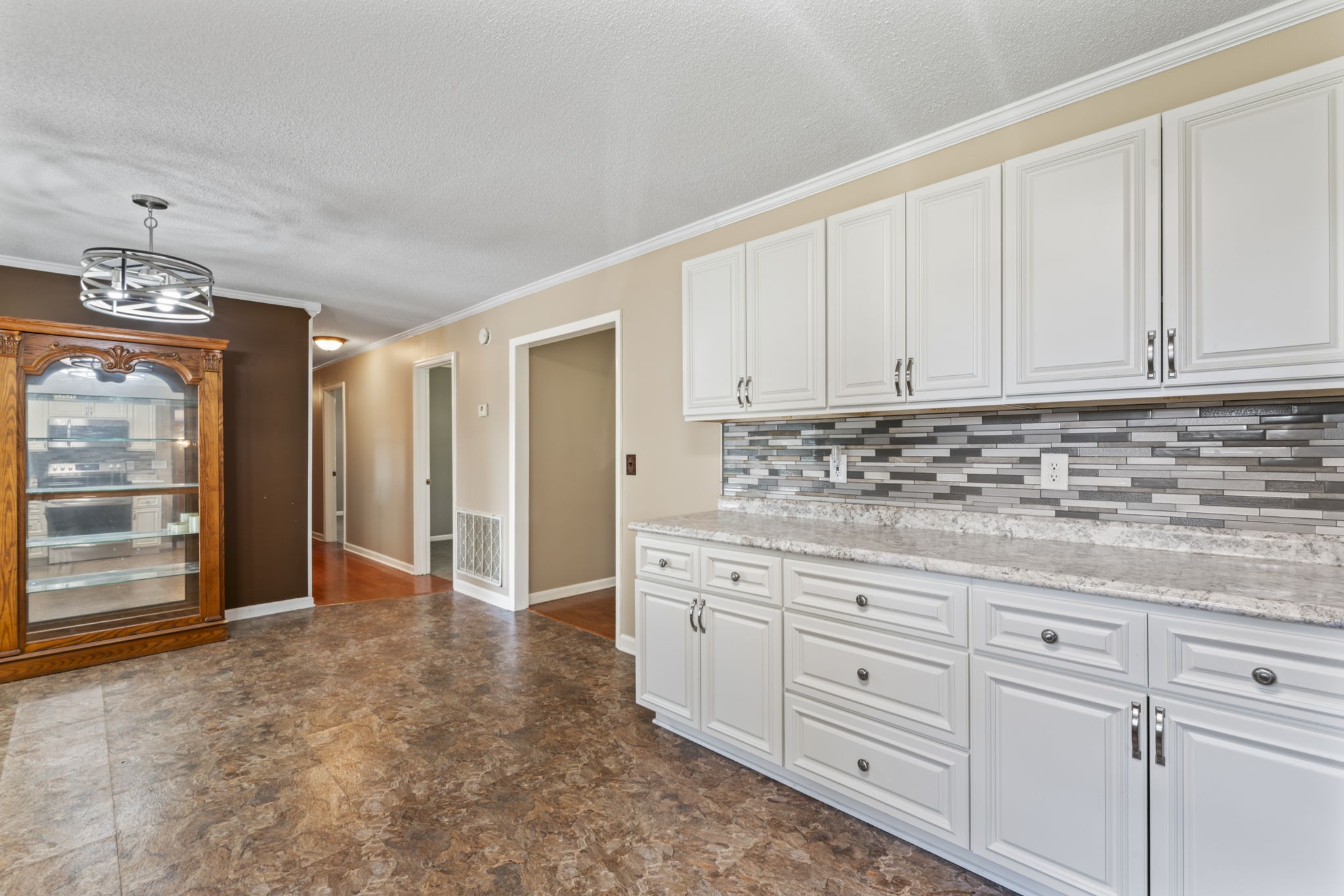 499 Ridgewood Drive Manchester, TN 37355 - Photo 12 of 37 a view of a kitchen with granite countertop cabinets