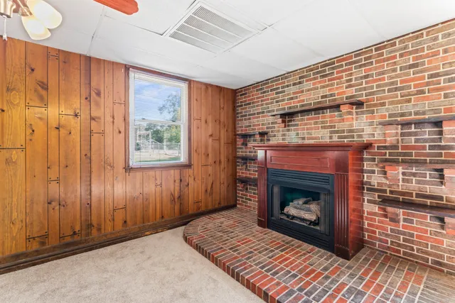 a living room with a fireplace