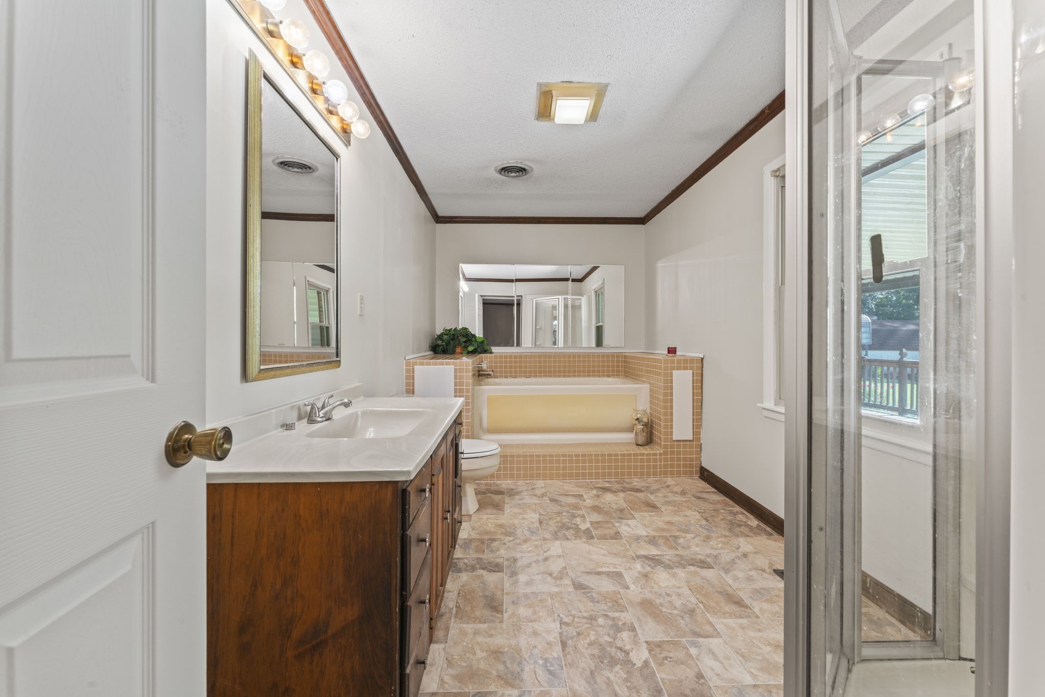 499 Ridgewood Drive Manchester, TN 37355 - Photo 23 of 37 a bathroom with a sink toilet and mirror