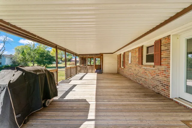 a hallway with wooden floor