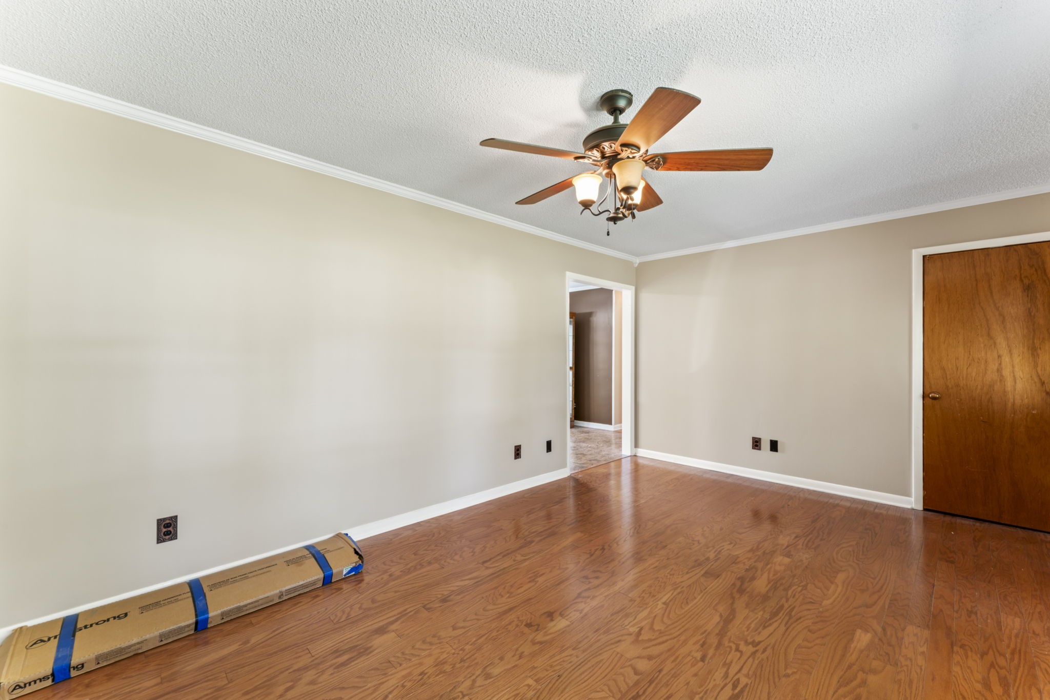499 Ridgewood Drive Manchester, TN 37355 - Photo 6 of 37 a view of an empty room with window and wooden floor