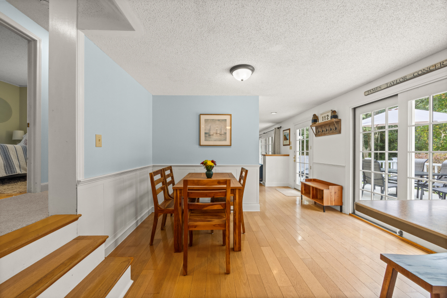 112 3rd Street North Edgartown, MA 02539 - Photo 13 of 36 a dining room with furniture and wooden floor