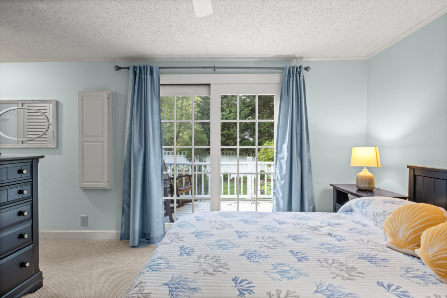 112 3rd Street North Edgartown, MA 02539 - Photo 16 of 36 a bedroom with a bed and a window