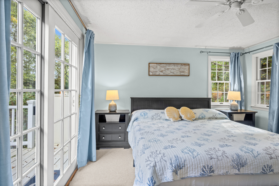 112 3rd Street North Edgartown, MA 02539 - Photo 17 of 36 a bedroom with a large bed and a window