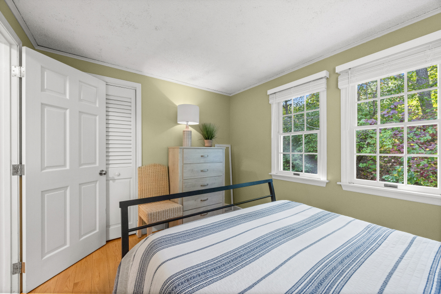 112 3rd Street North Edgartown, MA 02539 - Photo 25 of 36 a bedroom with a bed and a window