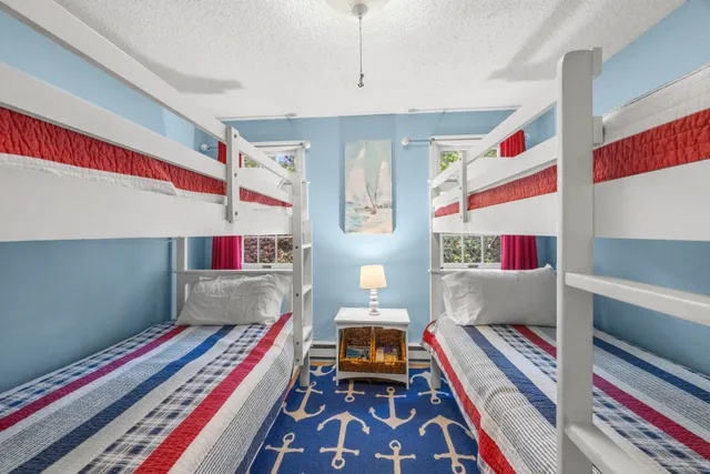 a room with furniture and a book shelf