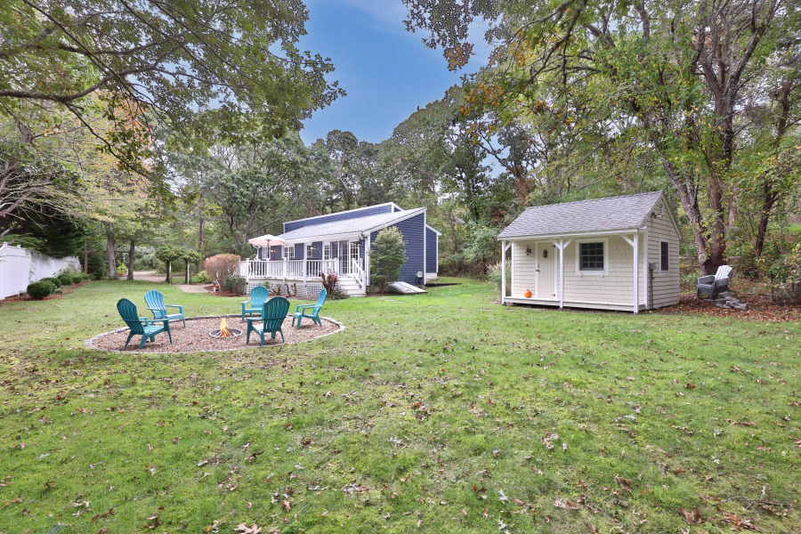 112 3rd Street North Edgartown, MA 02539 - Photo 32 of 36 a view of a house with backyard and sitting area