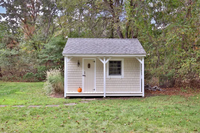 a house view with a backyard space