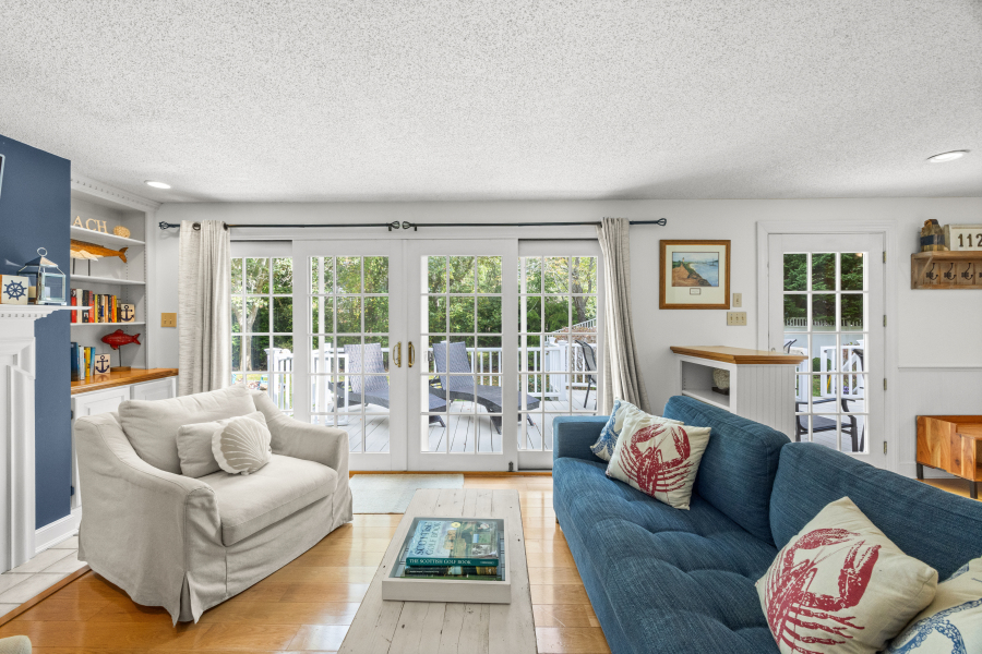 112 3rd Street North Edgartown, MA 02539 - Photo 4 of 36 a living room with furniture and a large window