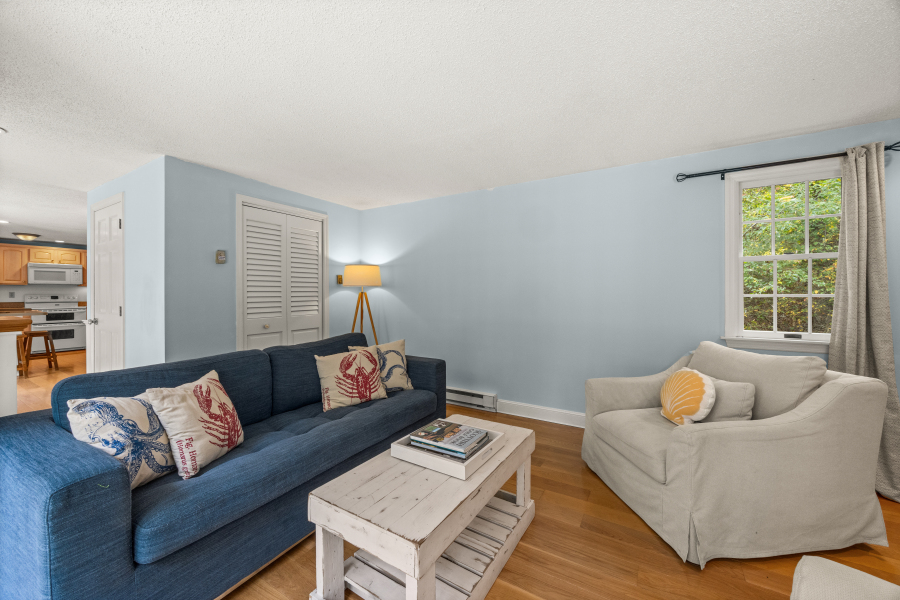 112 3rd Street North Edgartown, MA 02539 - Photo 6 of 36 a living room with furniture and a window