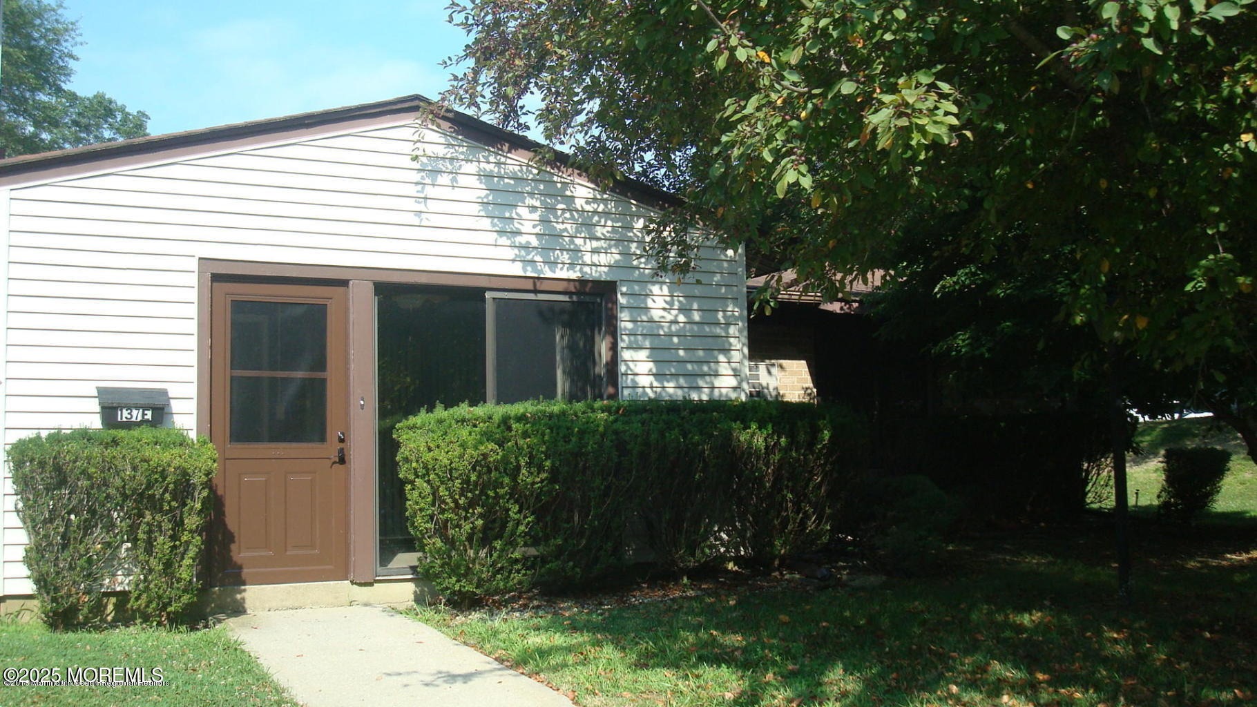 137 Amberly Drive, Unit E Manalapan, NJ 07726 - Photo 1 of 24 front view of a house