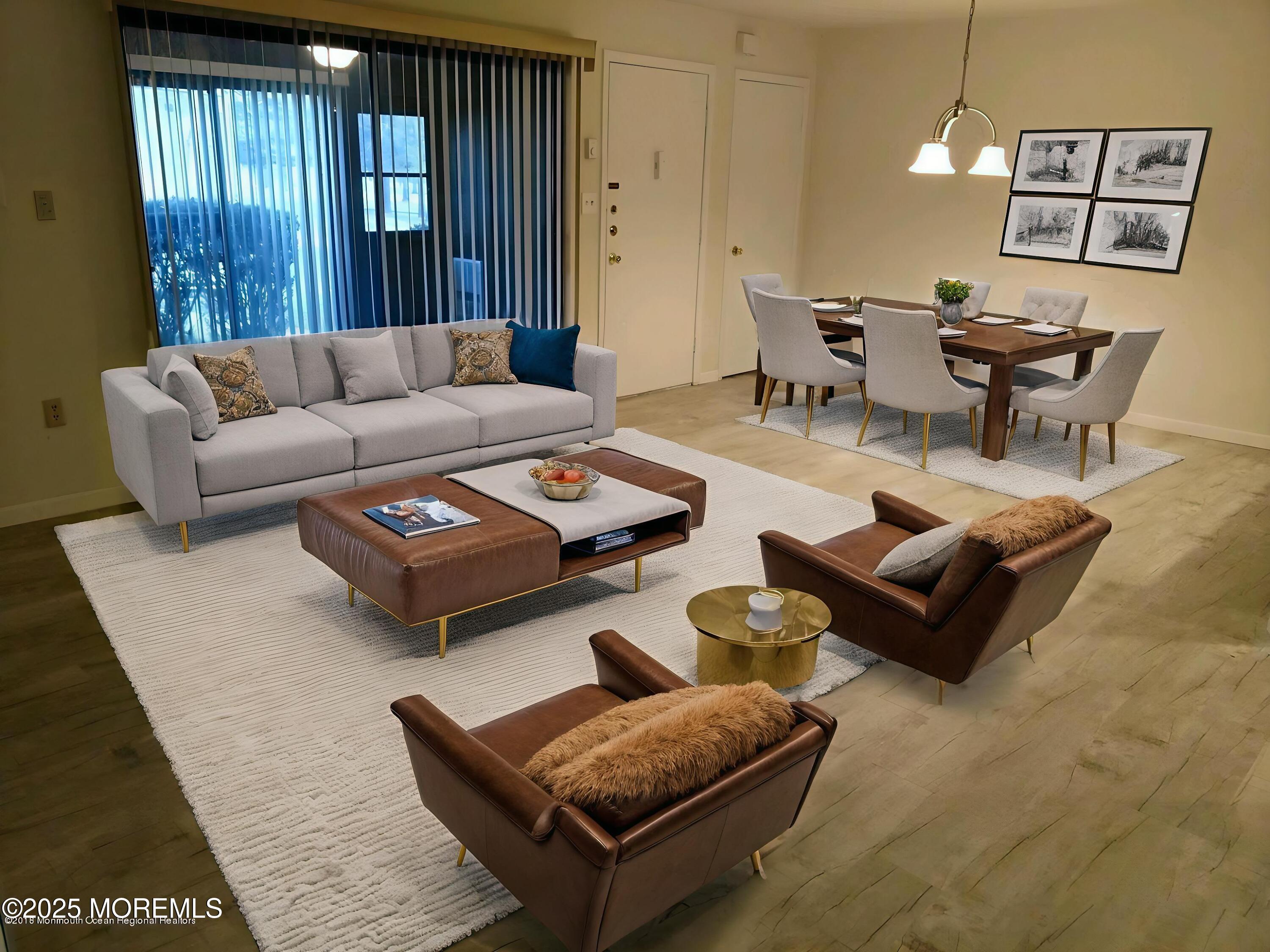 137 Amberly Drive, Unit E Manalapan, NJ 07726 - Photo 15 of 24 a living room with furniture and a window