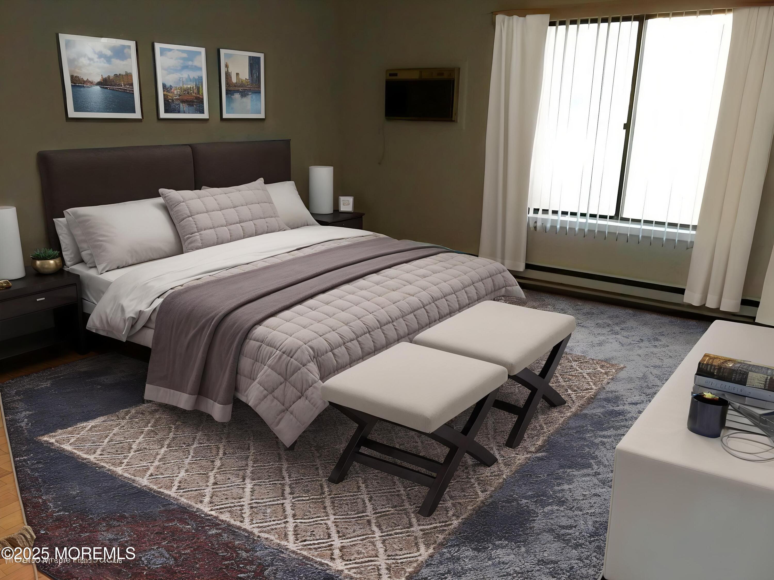 137 Amberly Drive, Unit E Manalapan, NJ 07726 - Photo 19 of 24 a bedroom with a bed a couch and a window