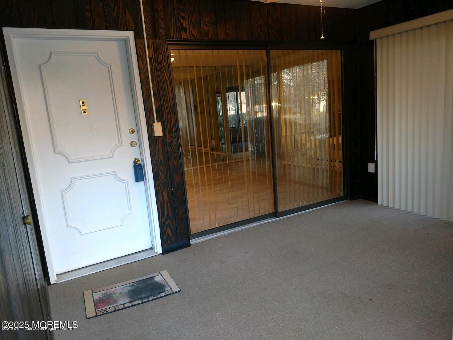 137 Amberly Drive, Unit E Manalapan, NJ 07726 - Photo 4 of 24 a view of a door