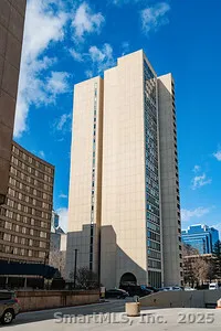 a tall building sitting on the side of a street