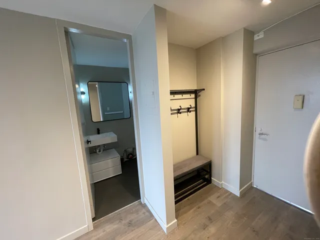 a view of a bedroom from the hallway