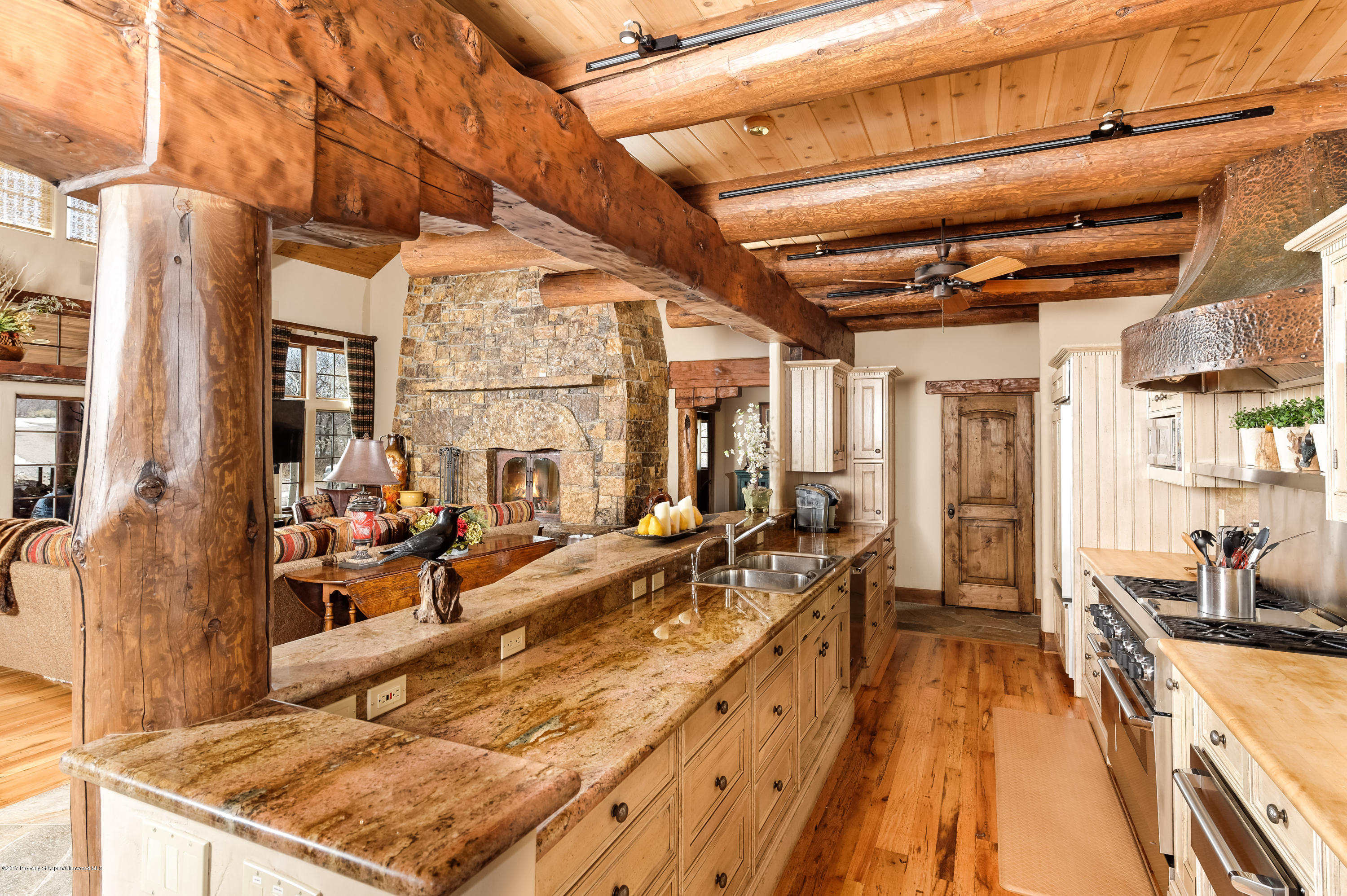 227 Sage Rim Circle Basalt, CO 81621 - Photo 13 of 42 a view of a living room and kitchen