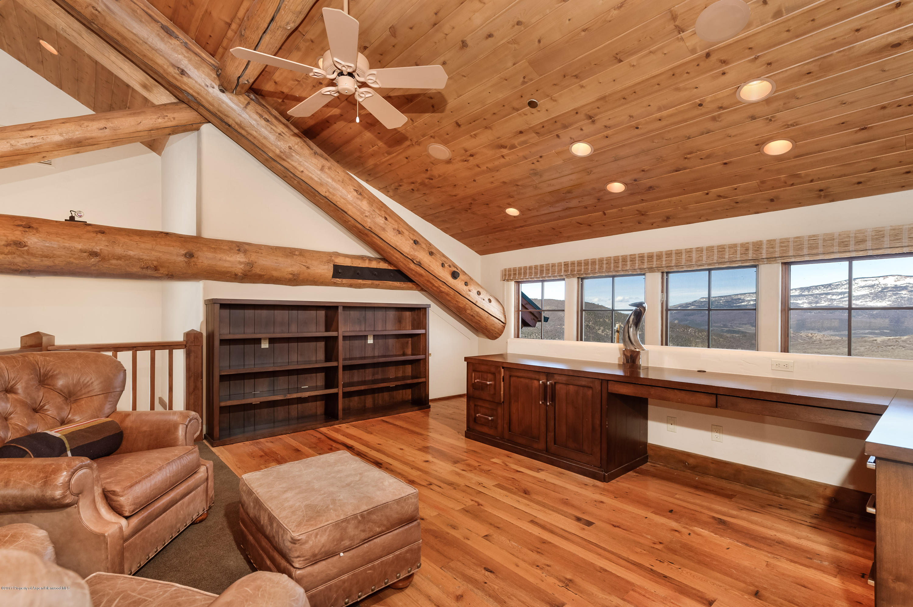 227 Sage Rim Circle Basalt, CO 81621 - Photo 18 of 42 a outdoor space with wooden floor and furniture