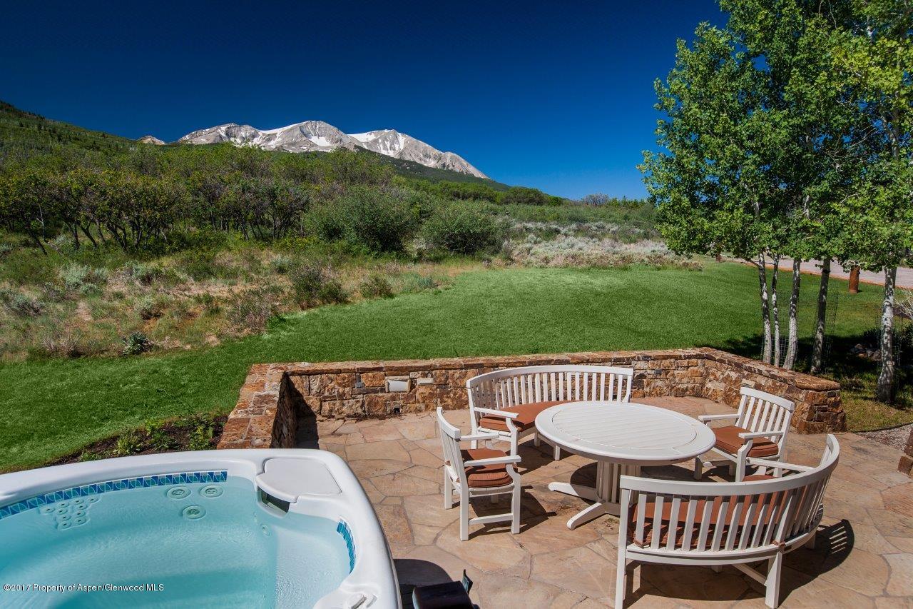 227 Sage Rim Circle Basalt, CO 81621 - Photo 3 of 42 a view of a chairs and table in patio