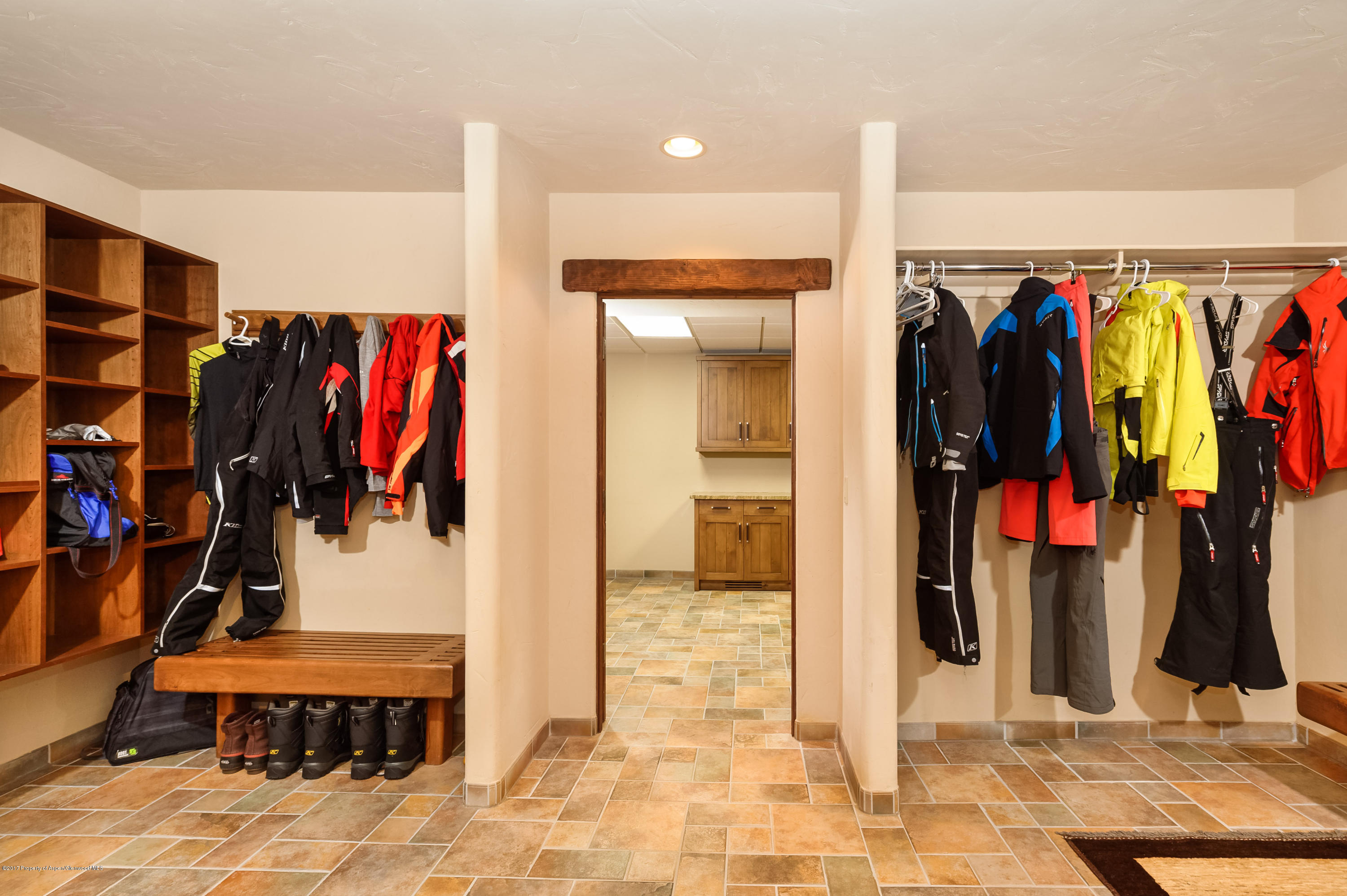 227 Sage Rim Circle Basalt, CO 81621 - Photo 32 of 42 a view of walk in closet with clothes and shoes
