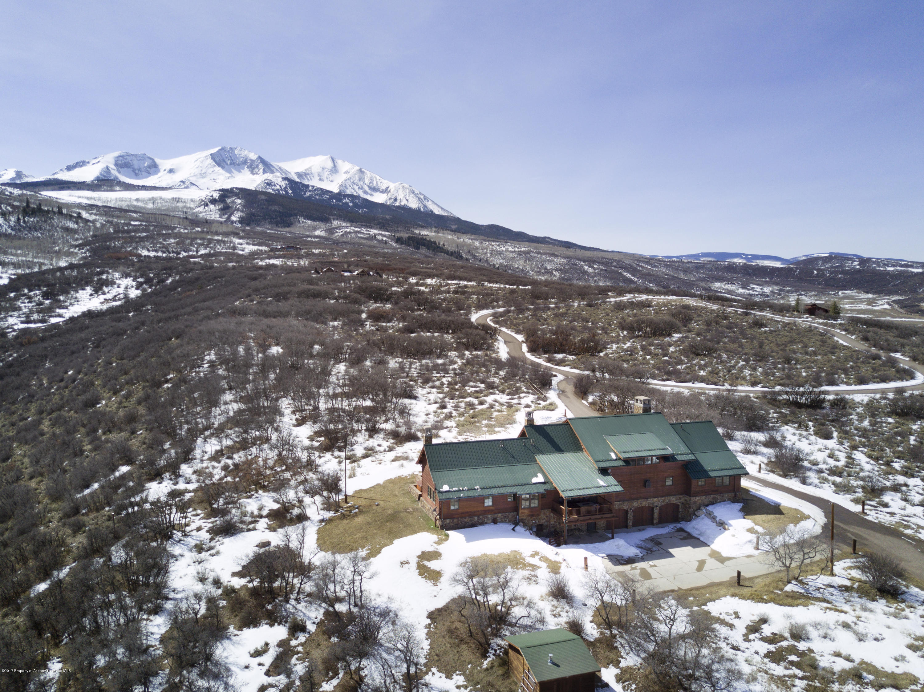 227 Sage Rim Circle Basalt, CO 81621 - Photo 4 of 42 an aerial view of a house with a yard and mountain view in back