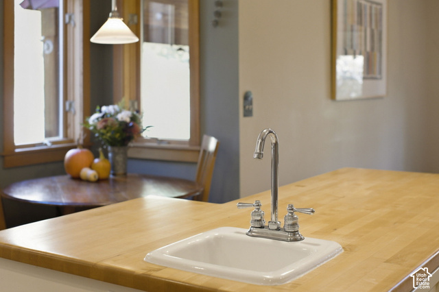 725 Canyon Road Smithfield, UT 84335 - Photo 31 of 100 Integrated sink with chrome faucet set into a light wood countertop