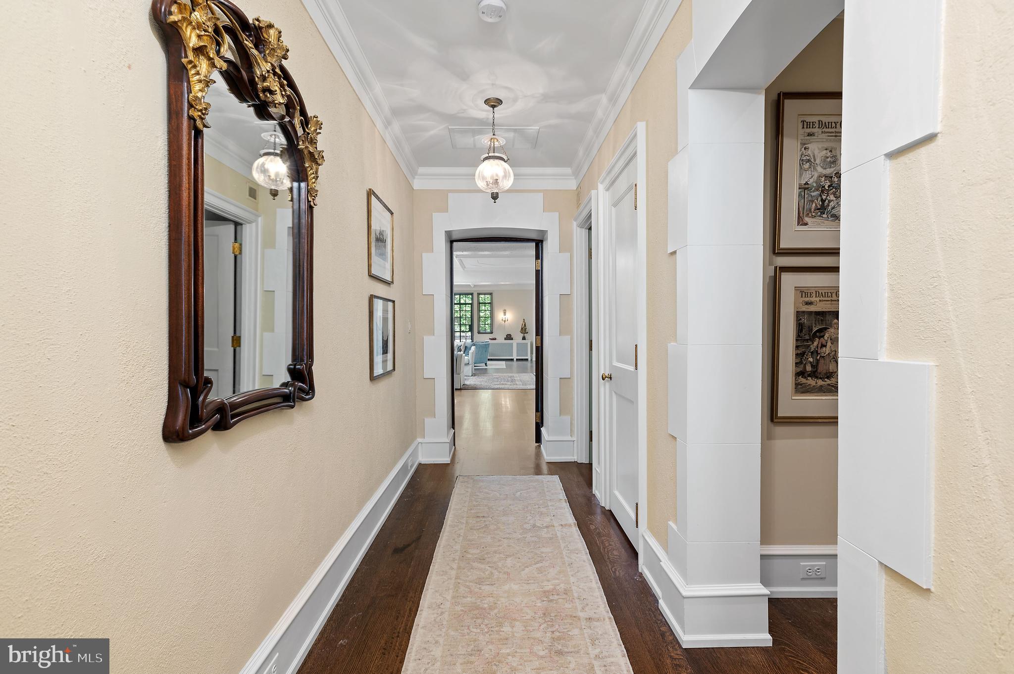 3000 Tilden Street Northwest, Unit ONEI Washington, DC 20008 - Photo 15 of 24 a view of a hallway with wooden floor and staircase