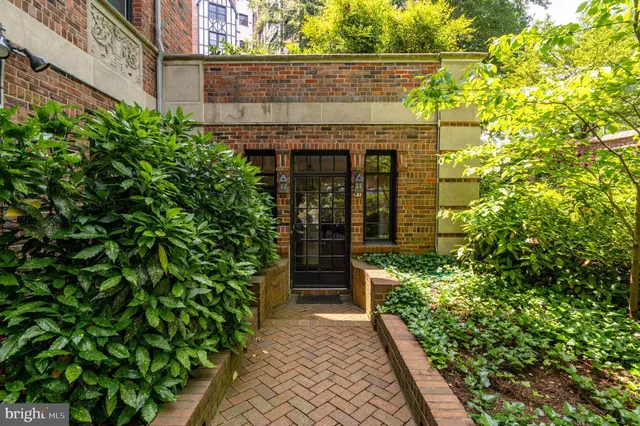 a view of a pathway both side of the house