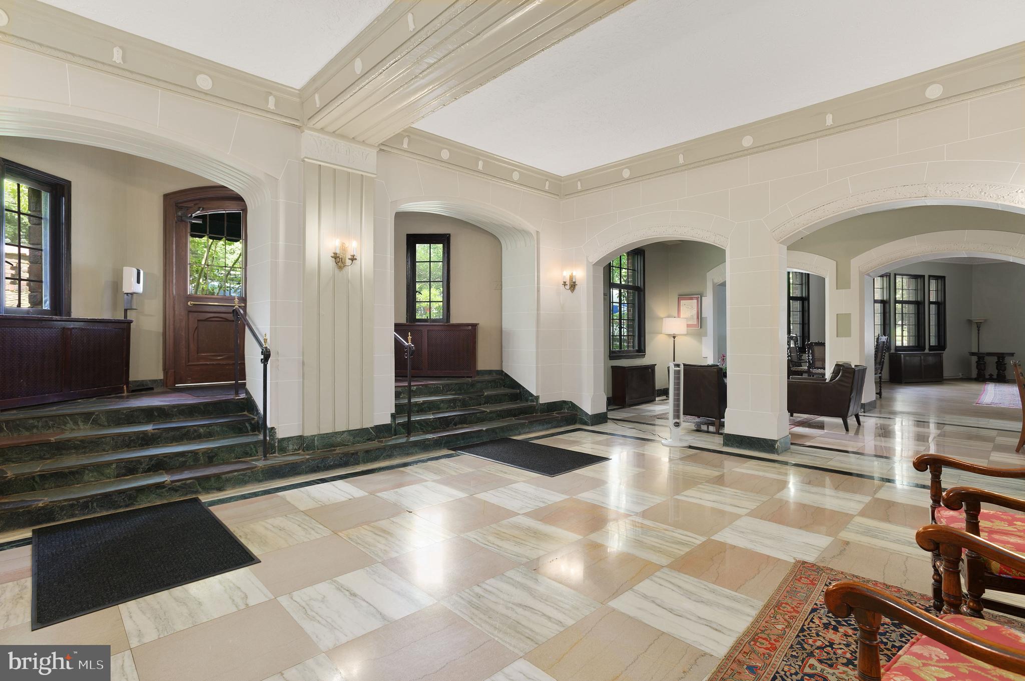 3000 Tilden Street Northwest, Unit ONEI Washington, DC 20008 - Photo 24 of 24 a lobby with furniture and a rug