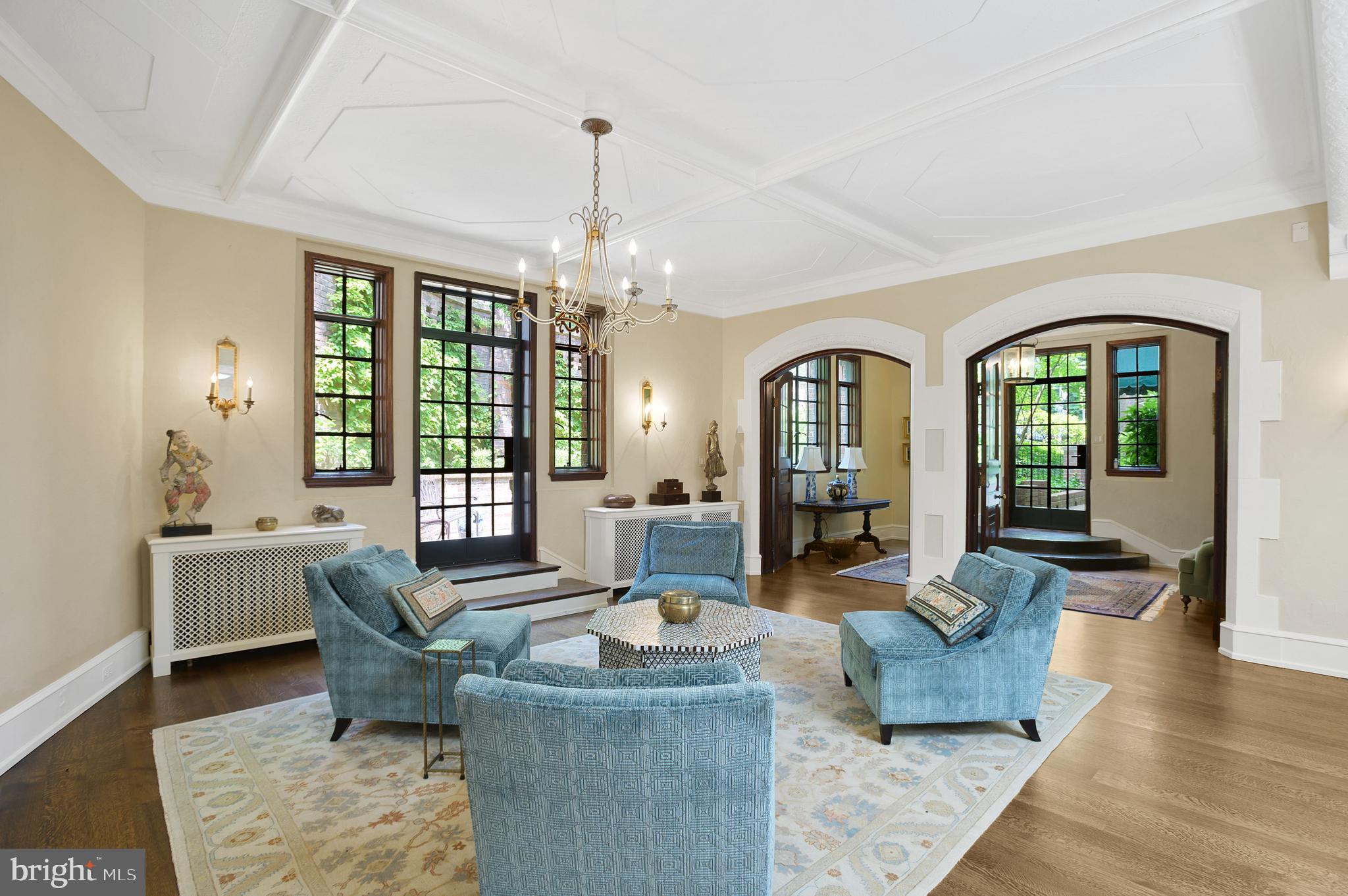 3000 Tilden Street Northwest, Unit ONEI Washington, DC 20008 - Photo 4 of 24 a living room with furniture and a chandelier