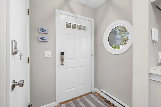 a bathroom with a table and a shower