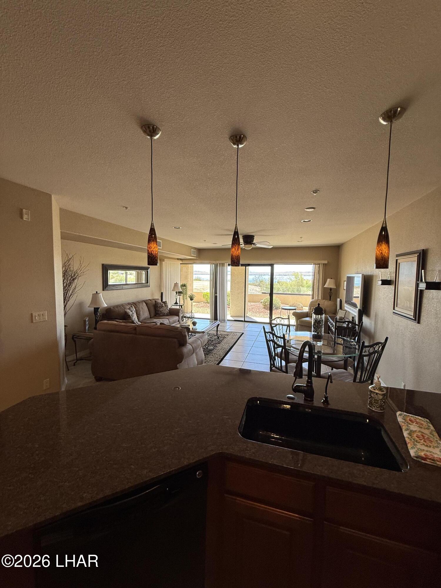 433 London Bridge Road, Unit B101 Lake Havasu City, AZ 86403 - Photo 14 of 35 a kitchen with sink and window