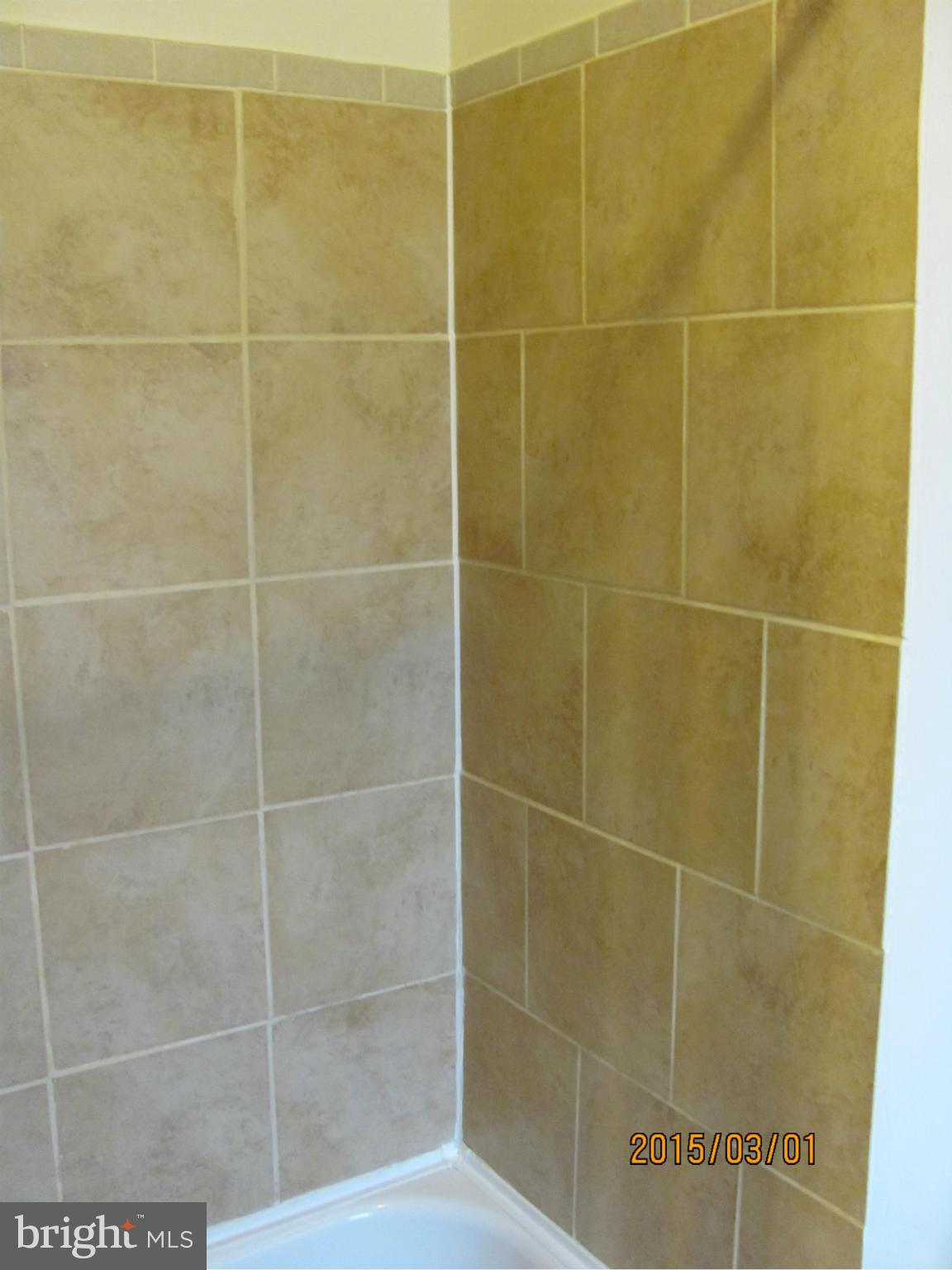 704 Quincy Street Northwest, Unit 202 Washington, DC 20011 - Photo 16 of 24 a bathroom with a shower