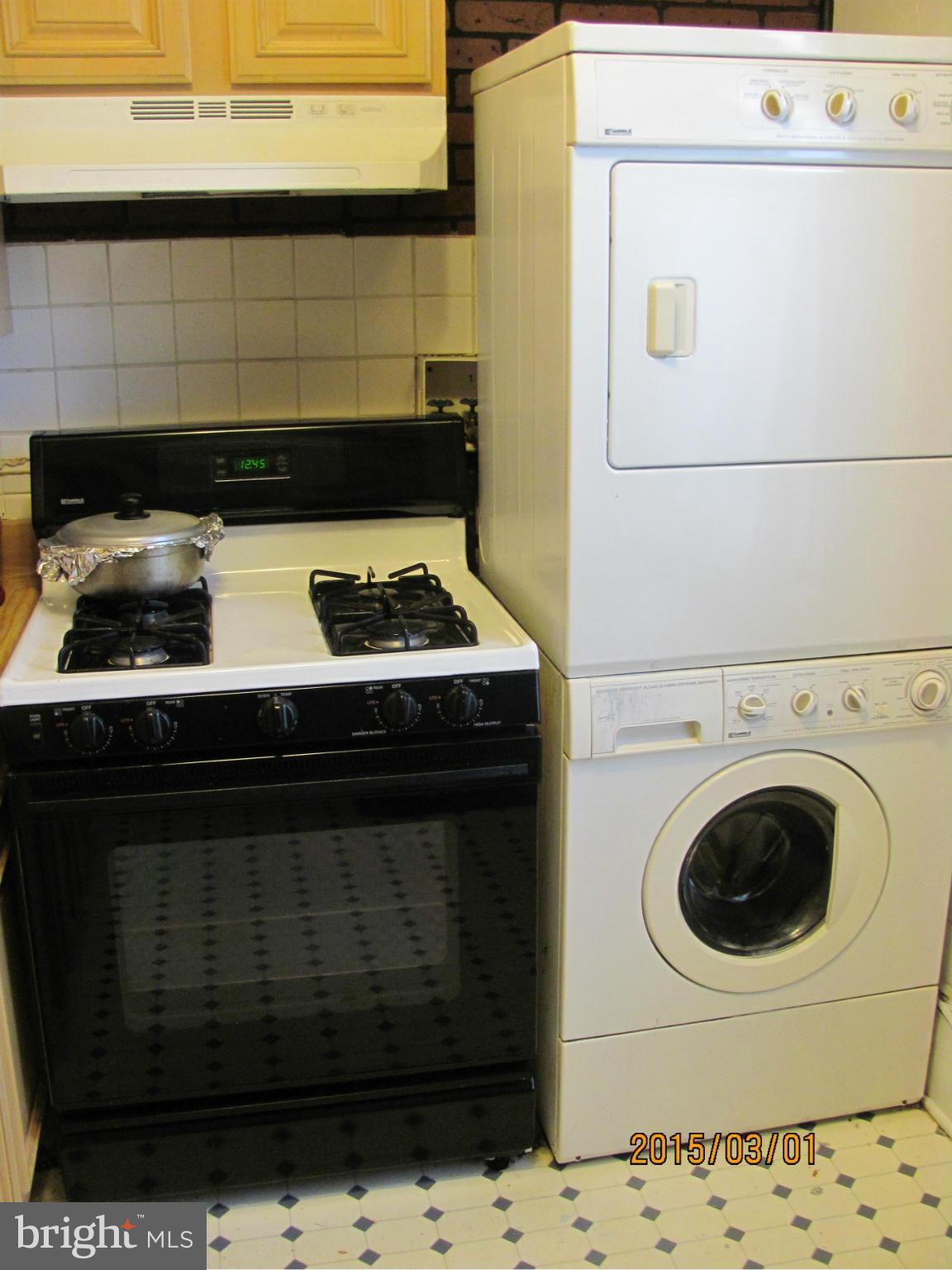 704 Quincy Street Northwest, Unit 202 Washington, DC 20011 - Photo 22 of 24 a close view of a stove top oven sitting inside of a kitchen