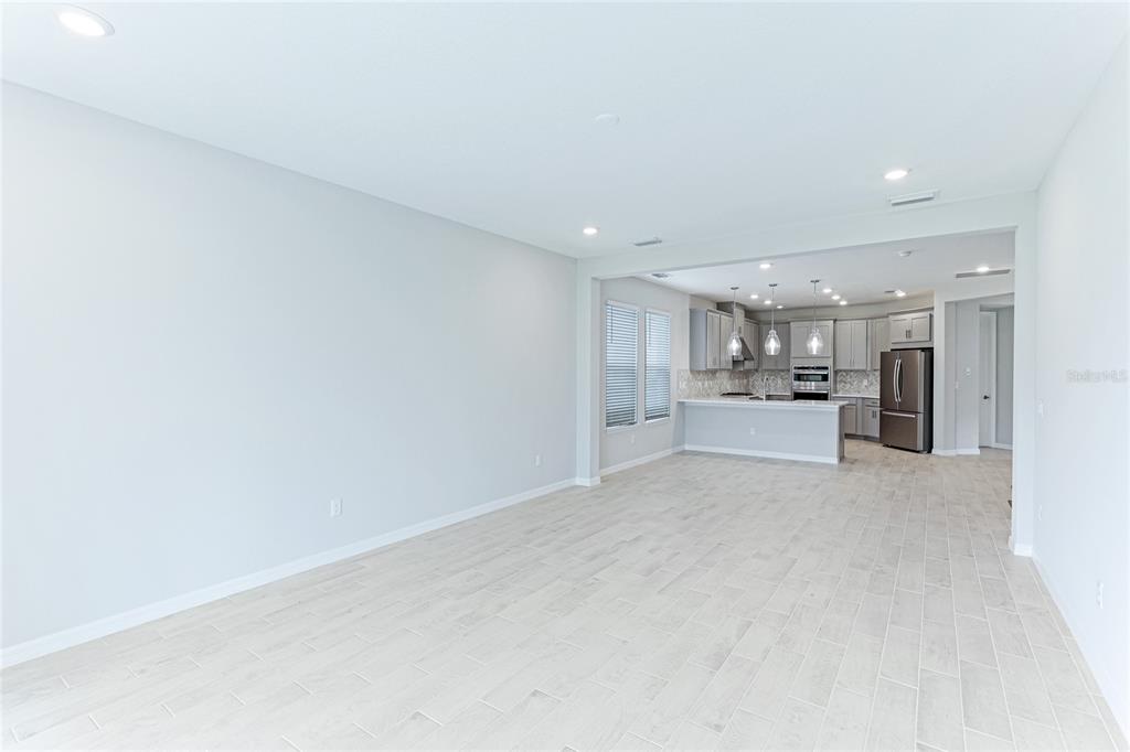 8440 Skye Rnch Boulevard Sarasota, FL 34241 - Photo 16 of 86 a view of a kitchen with white cabinets and kitchen appliances