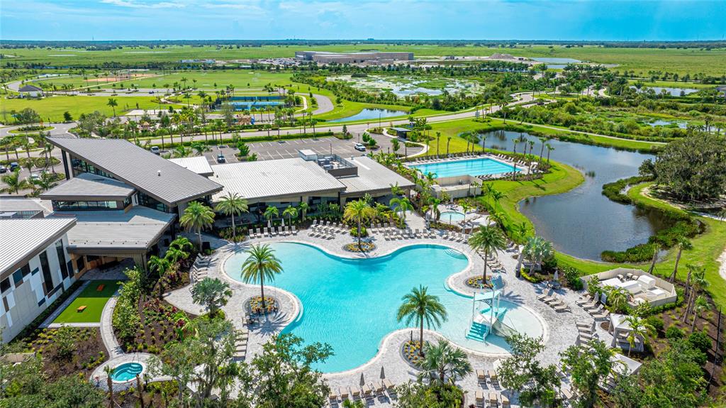 8440 Skye Rnch Boulevard Sarasota, FL 34241 - Photo 2 of 86 an aerial view of residential houses with outdoor space