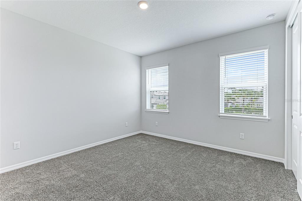 8440 Skye Rnch Boulevard Sarasota, FL 34241 - Photo 28 of 86 an empty room with a window