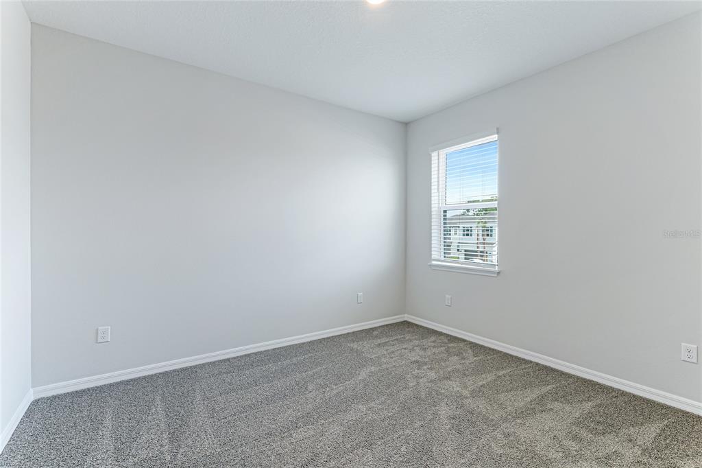 8440 Skye Rnch Boulevard Sarasota, FL 34241 - Photo 37 of 86 an empty room with a window