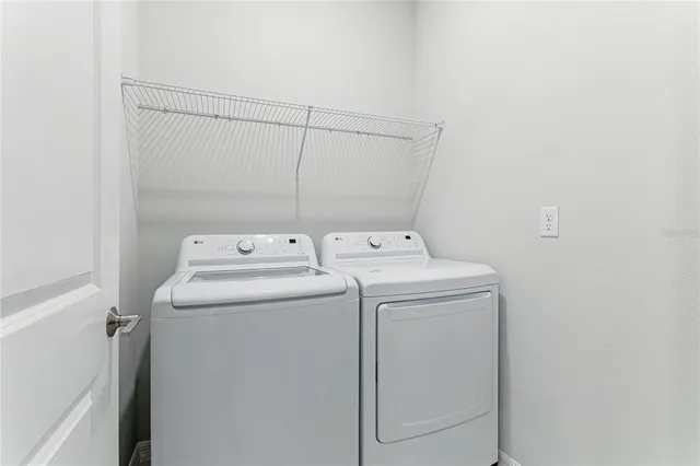 a view of an outdoor space and tennis court