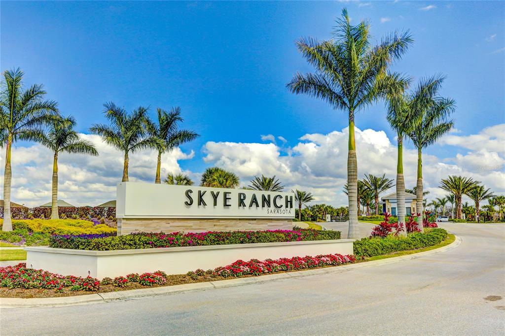 8440 Skye Rnch Boulevard Sarasota, FL 34241 - Photo 51 of 86 a sign that is on the side of the road