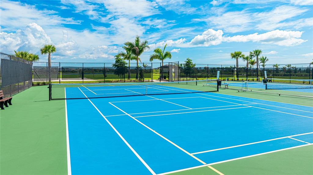 8440 Skye Rnch Boulevard Sarasota, FL 34241 - Photo 69 of 86 a view of an outdoor space and tennis court