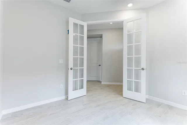 a kitchen with a refrigerator a sink and a oven