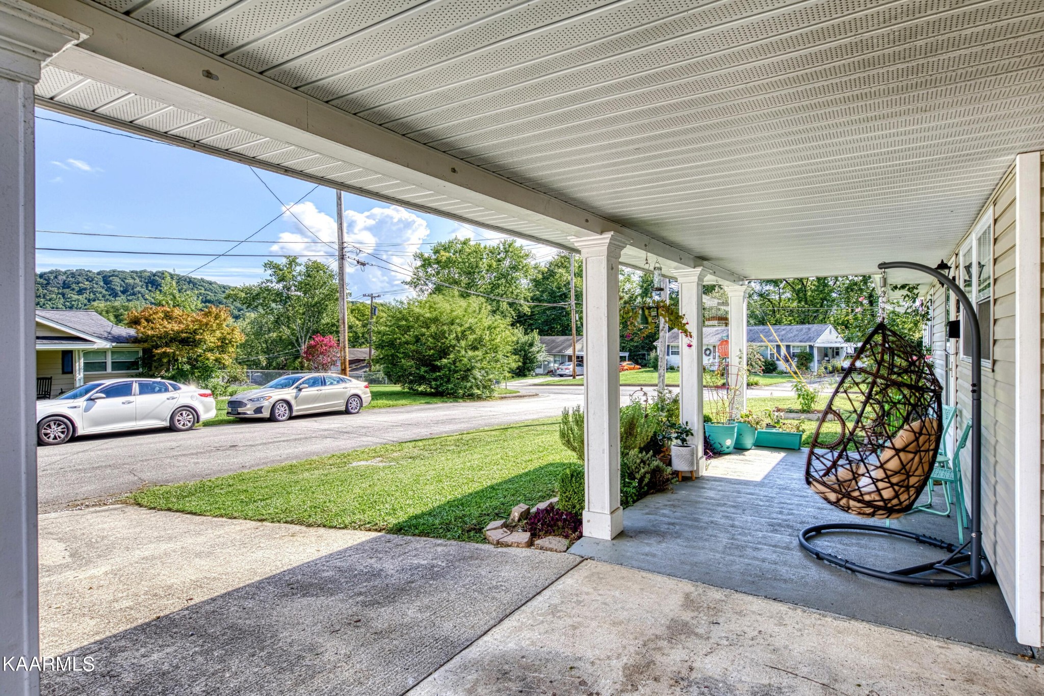 122 Briar Road Oak Ridge, TN 37830 - Photo 3 of 25 a view of a porch with furniture and a yard