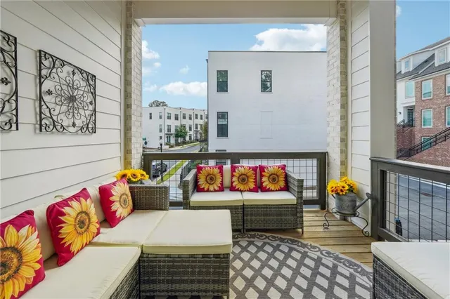 a view of a chairs and table in the patio