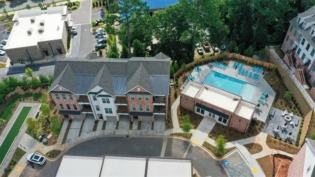 a view of a swimming pool with a patio