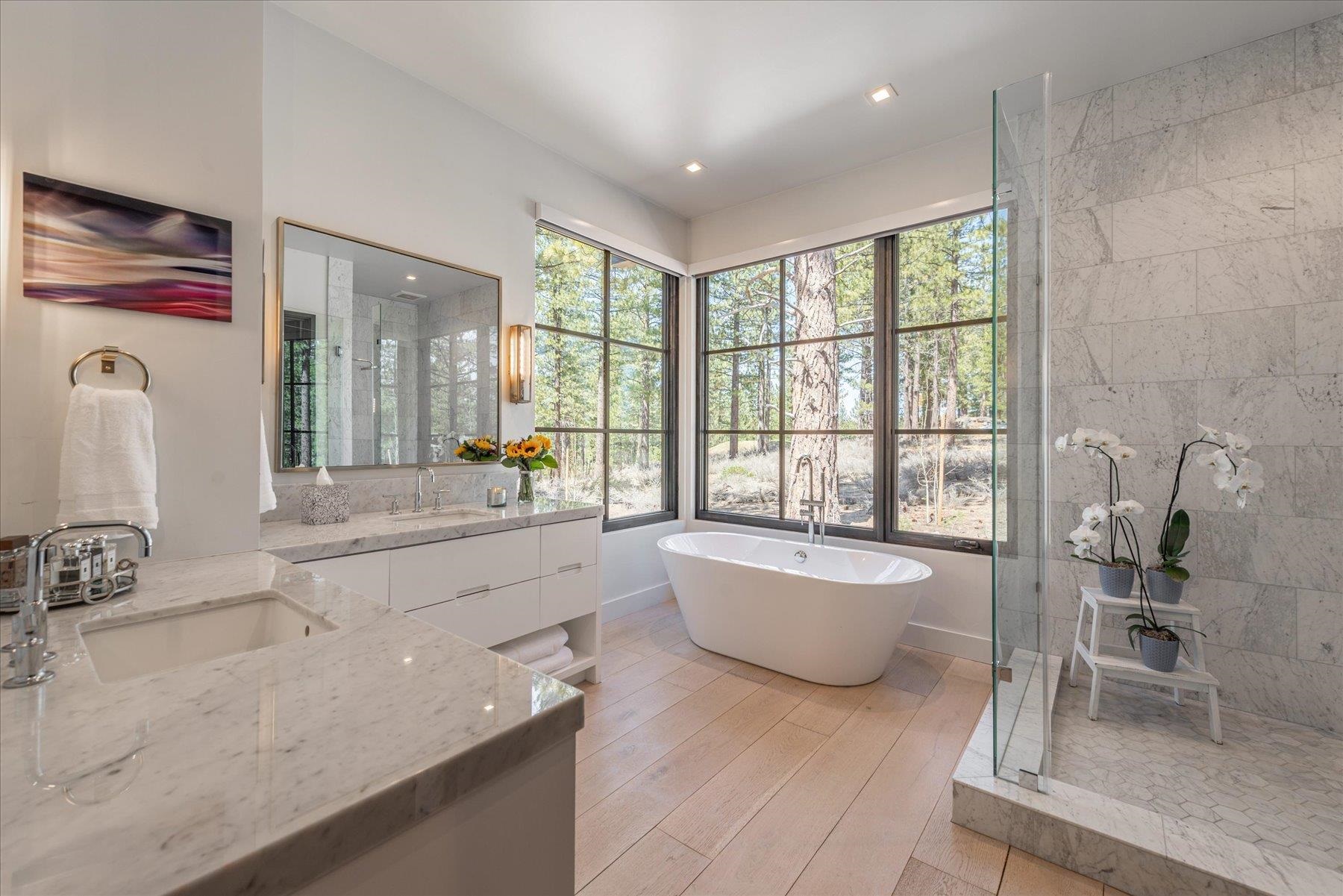 7750 Lahontan Drive Truckee, CA 96161 - Photo 14 of 21 a spacious bathroom with a tub sink and mirror