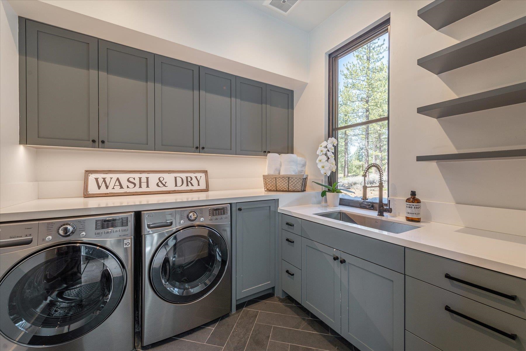 7750 Lahontan Drive Truckee, CA 96161 - Photo 21 of 21 a utility room with sink dryer and washer