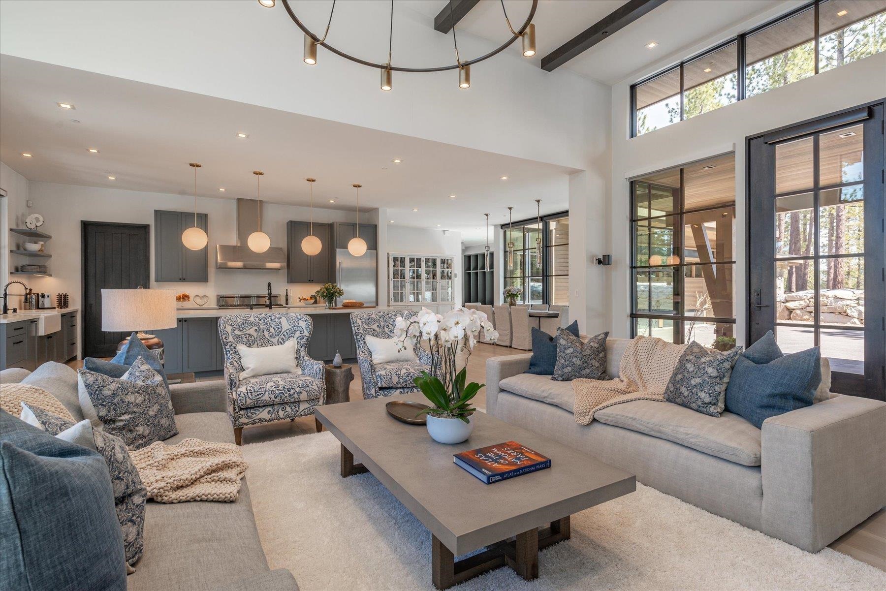 7750 Lahontan Drive Truckee, CA 96161 - Photo 8 of 21 a living room with furniture kitchen view and a large window