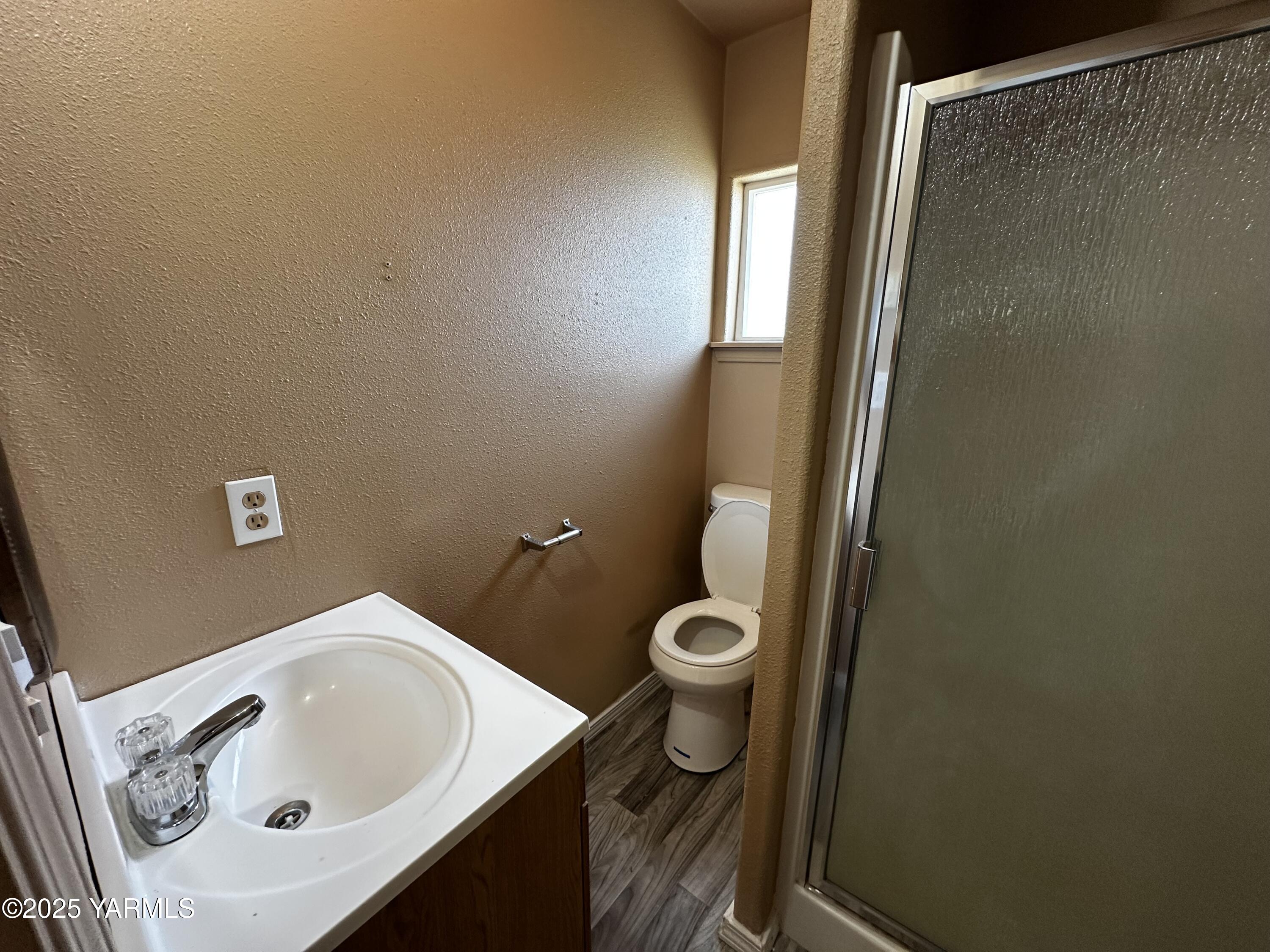 6941 Naches Heights Road Yakima, WA 98908 - Photo 18 of 21 a bathroom with a sink and toilet