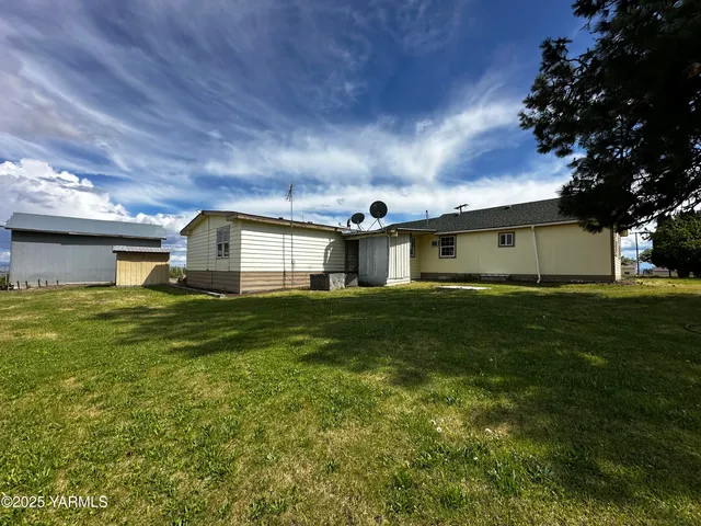a front view of house with garden